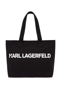 Sac fourre-tout noir en tissu durable avec le logo blanc "KARL LAGERFELD". Comprend deux anses supérieures solides pour un transport facile.