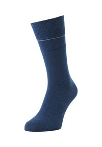 Calcetín de algodón azul marino con una parte superior acanalada, textura suave y una franja gris contrastante. Incluye un sutil logotipo de la marca en el lateral.