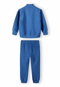 Blauwe katoenen sweatshirt met geribde kraag en manchetten, gecombineerd met bijpassende blauwe sweatpants met een elastische tailleband en een achterzak.