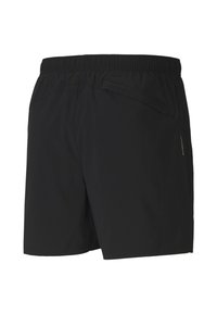 Svarta shorts med elastisk midja, som har två sidofickor och en ficka med dragkedja bak. Tillverkade av lätt, slätt tyg.