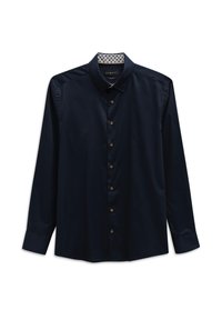 Marineblaue Langarmbluse mit Button-Down-Kragen, ausgestattet mit braunen Knöpfen, glatter Textur und einem gemusterten Stofffutter im Kragen.