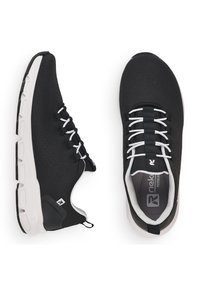 Black athletic shoes with a mesh upper, white accents, flat laces, and a textured rubber sole. Features logo and pull tab at the heel.
