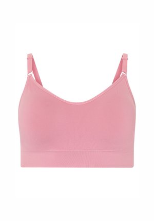 Soft pink seamless bralette with adjustable thin straps and a smooth band underneath the bust.