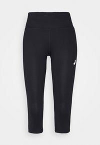 Leggings neri alla caviglia realizzati in materiale elasticizzato, con un alto girovita e un piccolo logo bianco sulla parte bassa della gamba sinistra.