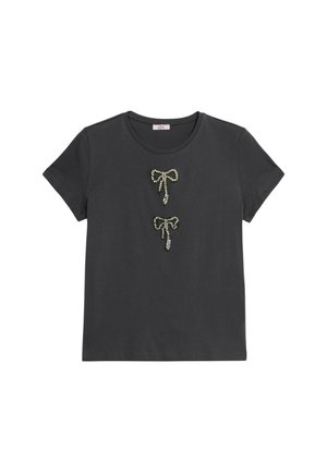 T-shirt in cotone nero con due applicazioni a forma di fiocco in paillettes sul davanti, collo girocollo classico e maniche corte. Tessuto morbido, vestibilità casual.