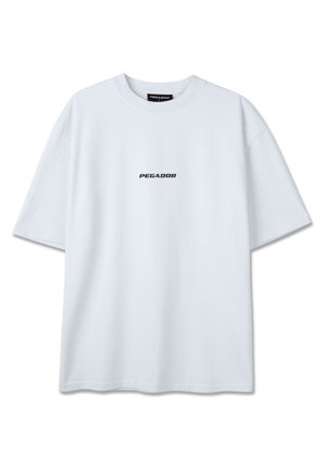 White short-sleeve t-shirt with crew neck and black "PEGADOR" logo centered on the chest.