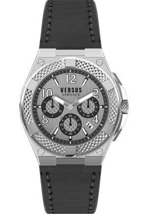 Silver-tone Versus watch with textured black dial, chronograph subdials, Arabic numerals, and a black leather strap.