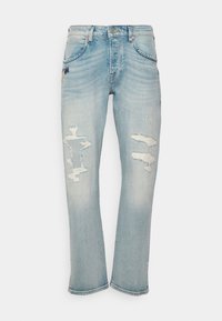 Jean en denim bleu clair avec une coupe droite, présentant des zones usées aux cuisses et aux genoux, et un design classique à cinq poches.