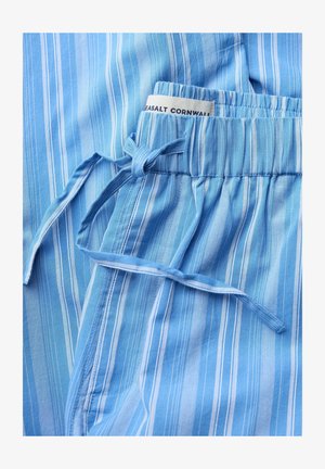 Blauw-wit gestreepte stof met verticale strepen, elastische tailleband en strikkoord, met een label waarop "Seasalt Cornwall" staat.