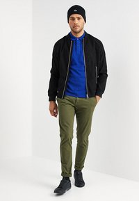 Lacoste Polo majica - captain