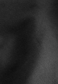 Black fabric with a smooth texture, featuring a fine, even weave. The surface reflects light subtly, creating a slight sheen.