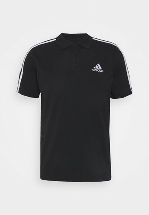 Polo Adidas noir avec des rayures blanches sur les épaules et le logo Adidas sur la poitrine gauche, doté d'une patte de boutonnage à trois boutons.