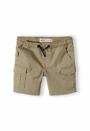 Beige shorts kargo dengan pinggang elastis, tali serut hitam, dua saku samping, dan satu saku samping, terbuat dari kain yang lembut.