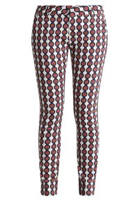 Pantalons slim-fit à motif en tissu lisse. Présente un motif de cercles répété en bleu marine, rouge et blanc. Braguette zippée et passants de ceinture.