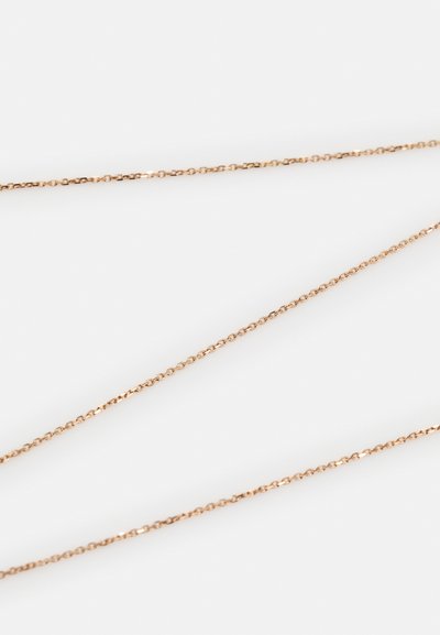 Colar de corrente em ouro rosado com um design delicado, apresentando elos ovais e redondos interligados, destacando um acabamento liso e brilhante.