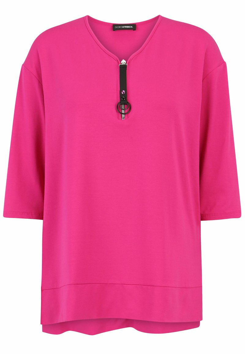 Fuchsia short-sleeve top with a V-neck and a black zip closure, featuring a circular accent. Made of smooth, lightweight fabric.