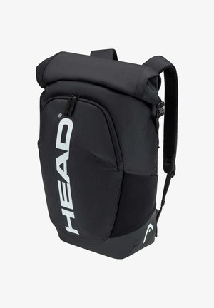 Sac à dos noir à fermeture roulante, poche zippée à l'avant, bretelles matelassées et grand logo blanc "HEAD" sur le panneau avant.