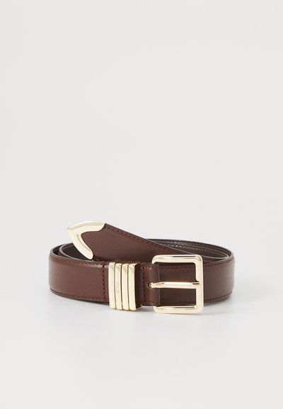 Brown leather belt with a shiny gold metal buckle, featuring a unique curved end and three horizontal accents on the buckle.