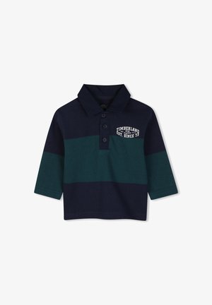 Polo met lange mouwen, marineblauw en groen gestreept, met drie knopen en witte Timberland-logotekst op de linkerborst.