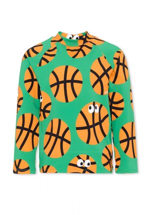 Maglia verde a maniche lunghe con grandi palloni da basket arancioni stampati ovunque, alcuni con occhi da cartone animato.