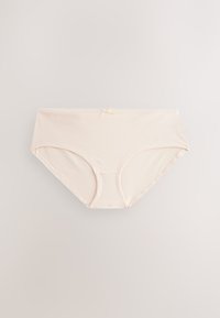 Jasnobeżowe damskie majtki bawełniane z małą dekoracyjną kokardką na środku talii na neutralnym tle.