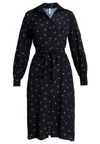 Svart, knappad klänning med långa ärmar och midja med bälte. Har ett blommönster i guld och vitt på ett mjukt tyg.