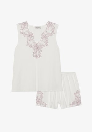 Set di pigiami bianco composto da un top senza maniche con rifiniture in pizzo viola e pantaloni corti abbinati decorati con dettagli in pizzo all'orlo. Tessuto morbido.