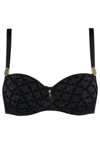 Černá podprsenka s tvarovanými košíčky, průhlednou vrstvou s geometrickým vzorem, akcenty ve zlatém tónu a středovou mašličkou.