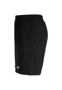Pantaloni sportivi neri realizzati in tessuto leggero, con vita elasticizzata, spacchi laterali e un logo Nike bianco sull'orlo.