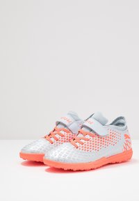 Puma Botines de fútbol para césped - light blue