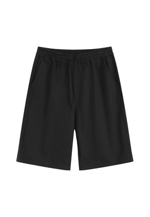 Shorts noirs arrivant au genou avec taille élastique et poches latérales, en tissu léger.