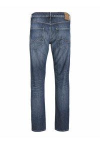 Jeans de mezclilla, lavado azul medio, de pierna recta, que cuentan con dos bolsillos traseros con costuras decorativas y una etiqueta de piel de la marca en la cintura.