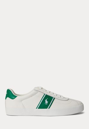 Valge madala säärega toss rohekas kannatabaga ja küljeribaga, misl on valge tikitud polo mängija logo ribal ja valged paelad.