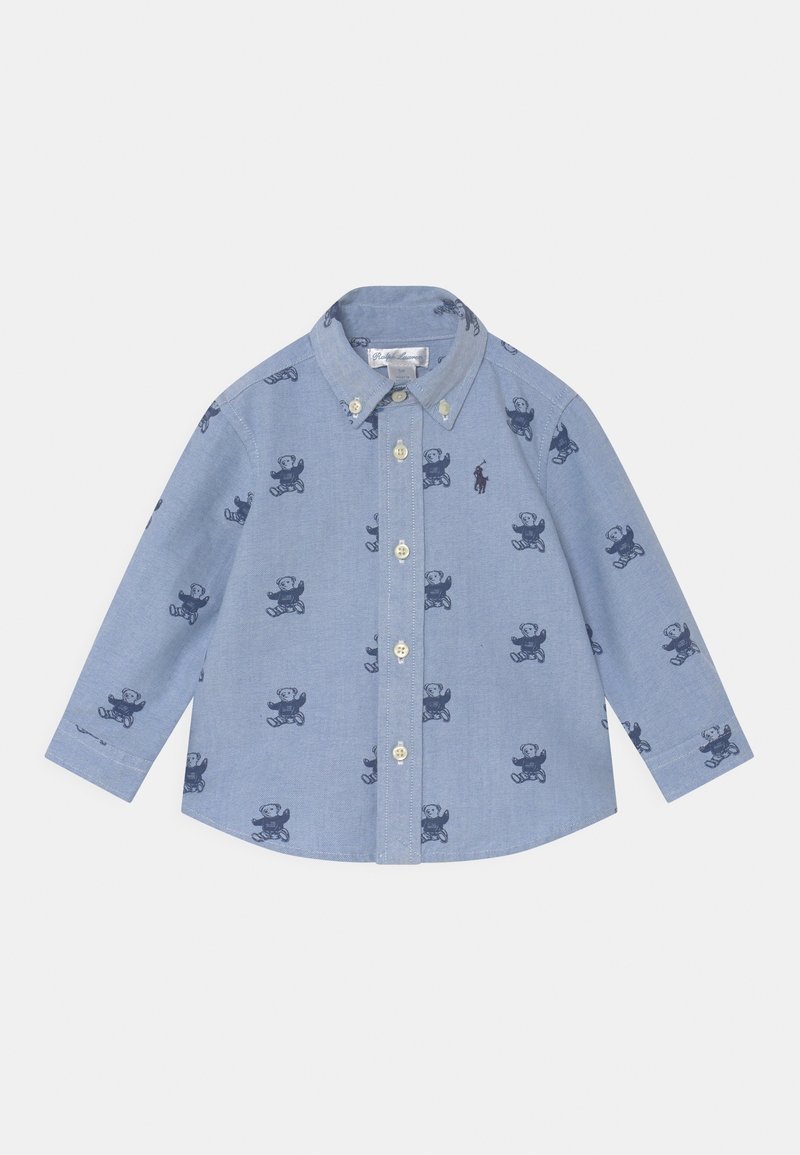Light blue long-sleeve shirt featuring teddy bear patterns, a classic collar, and button-down front. Soft cotton fabric with a smooth texture.