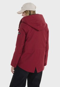 Aigle Krátky kabát - deep red