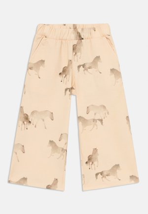 Pantalon beige à jambes larges avec taille élastique, décoré d’un motif répété de chevaux brun clair style aquarelle.