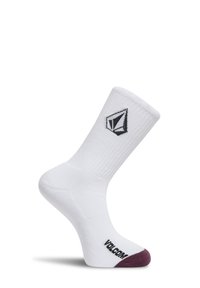 Chaussette blanche classique avec logo géométrique noir près du haut et renfort violet foncé à l’orteil sur fond blanc uni.