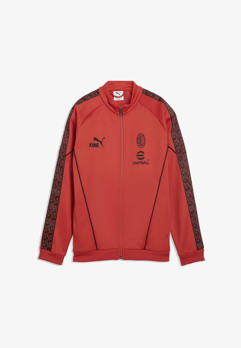 Jachetă sport roșie cu fermoar, cu accente negre și mâneci cu model. Prezintă logo-urile „Puma”, „KING” și „Football” pe partea din față.