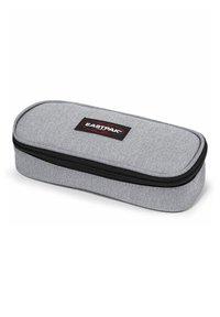 Gray pencil case made of fabric with a textured surface, featuring a black zipper and a red and black Eastpak logo on top.