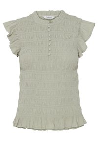 Blouse verte clair, texturée, avec des manches à volants, un col haut et des boutons sur le devant. Elle possède un ourlet à volants superposés.