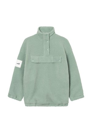Fleece pullover in soft mint green with a high collar, snap closures, a front pocket, and a white label on the left sleeve.