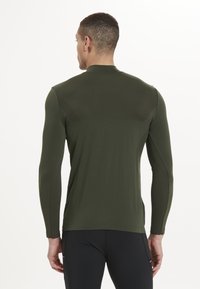 Endurance FUNKTION JARO M SEAMLESS MIDLAYER - Langærmet T-shirt - rosin