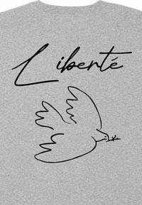 Grijze katoenen t-shirt met een zwart lijntekening van een duif met een tak, vergezeld van het woord "Liberté" in gestileerde schrift erboven.