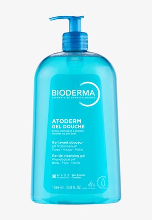 Klare blaue Plastikflasche mit Pumpenspender; beschriftet mit "Bioderma Atoderm Gel Douche" für normale bis trockene Haut; 1 Liter Fassungsvermögen.