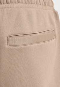 Tracksuit bottoms - brown washed