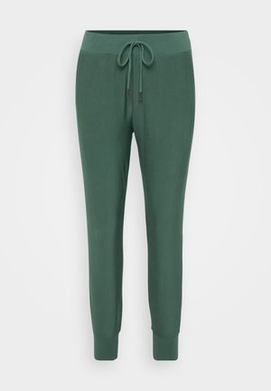 Green jogger pants made of soft fabric, featuring an elastic waistband with a drawstring, tapered legs, and ribbed cuffs at the ankles.