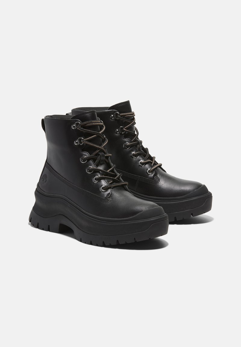 Timberland Kotníkové boty na platformě - black full grain