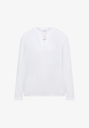 Blusa bianca a maniche lunghe con orlo elastico e piccolo spacco a V sul collo, etichettata "CECIL", esposta su sfondo bianco.