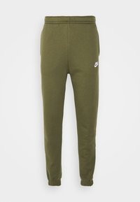 Olivgröna sweatpants med elastisk midjeband och muddar. Har en liten vit Nike-logotyp på låret. Tillverkade av mjukt, texturerat tyg.