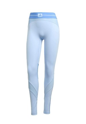 Lichtblauwe sportleggingen met een aansluitend ontwerp, featuring ribbelaccenten bij de taille en de zijkanten, en een gladde textuur overal.